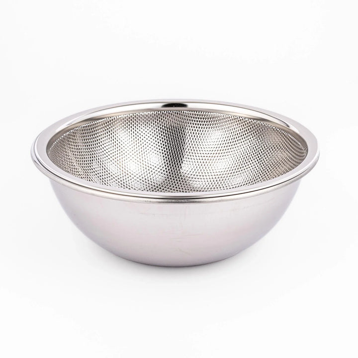 Fine stainless mesh strainer bowl with wide rim, perfect for draining noodles or rinsing rice and produce.