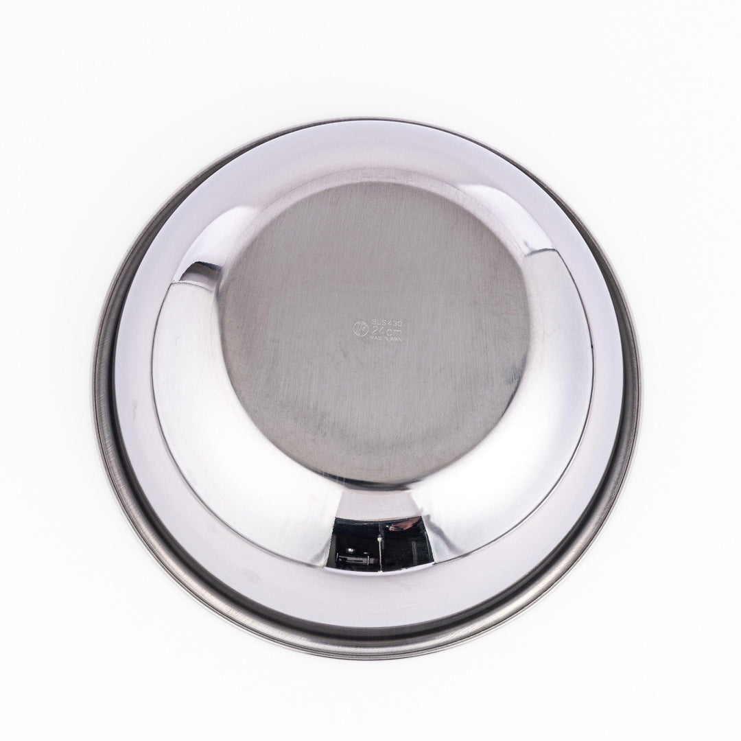 Stainless mixing bowl with smooth interior and flared rim, great for prepping, mixing, or serving daily.