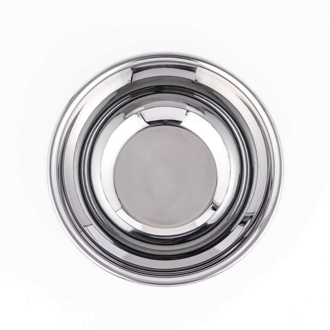 Stainless mixing bowl with smooth interior and flared rim, great for prepping, mixing, or serving daily.