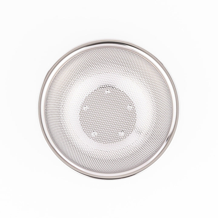 Fine mesh stainless strainer bowl with curved shape, ideal for washing grains, fruits, or vegetables.