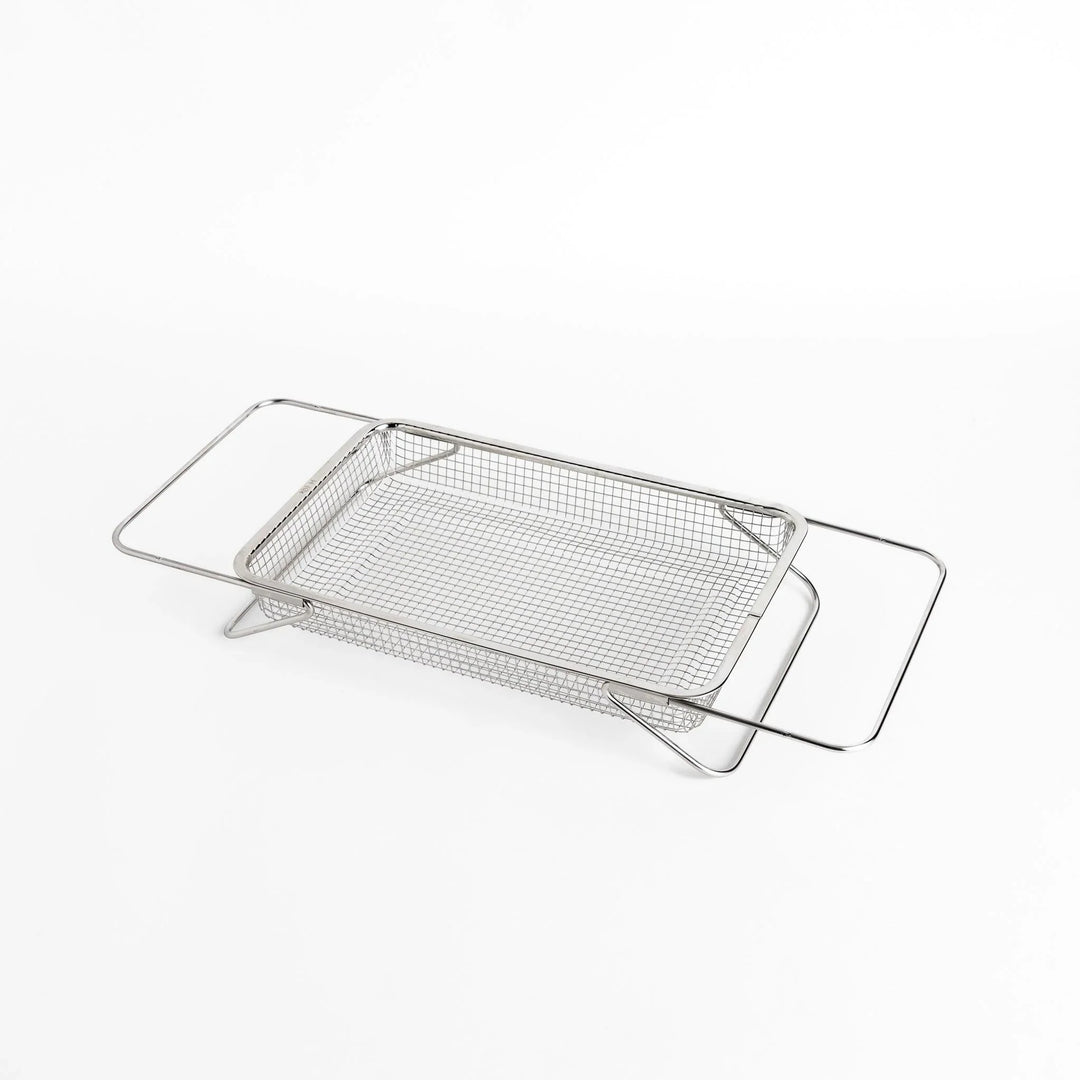 Fine mesh stainless steel draining basket, ideal for washing or draining ingredients during food preparation.