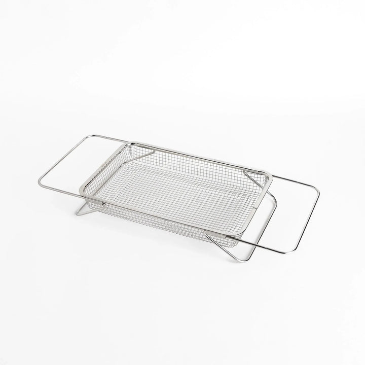 Fine mesh stainless steel draining basket, ideal for washing or draining ingredients during food preparation.