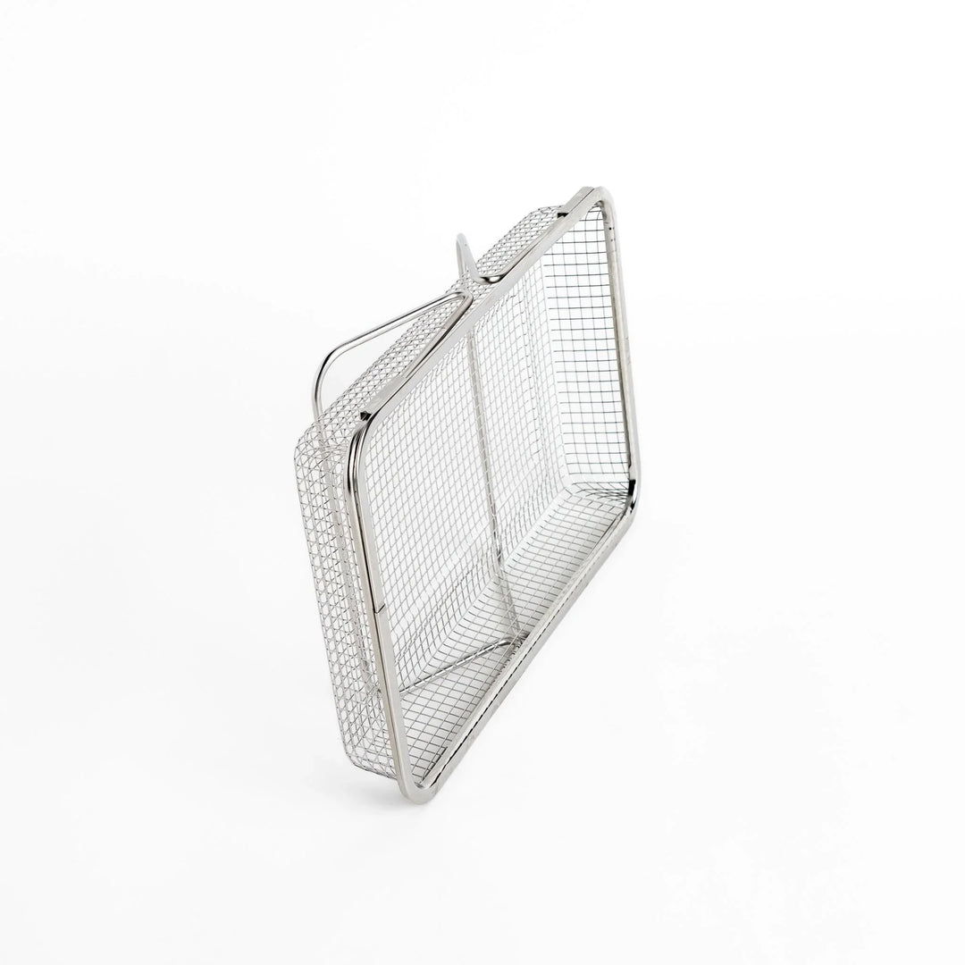 Fine mesh stainless steel draining basket, ideal for washing or draining ingredients during food preparation.