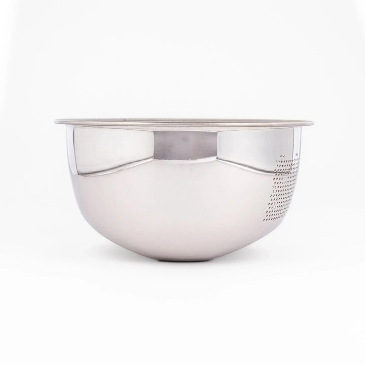 Japanese stainless steel rice washing bowl with perforated and slotted drainage sections for quick rinsing.