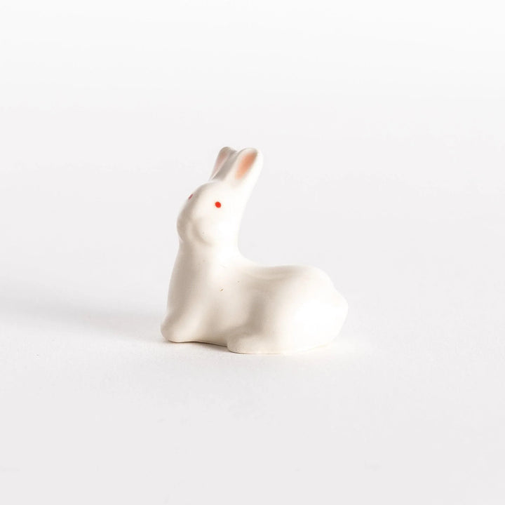 Standing rabbit shaped ceramic chopstick rest with gentle expression adding cute accent to dining.