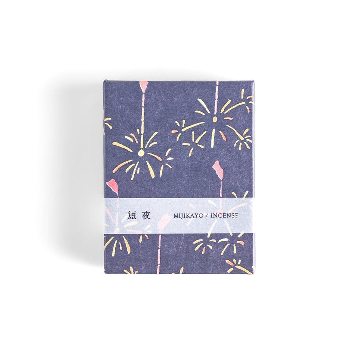 Japanese incense with brown sticks in dark blue box decorated with fireworks for soothing summer aroma.