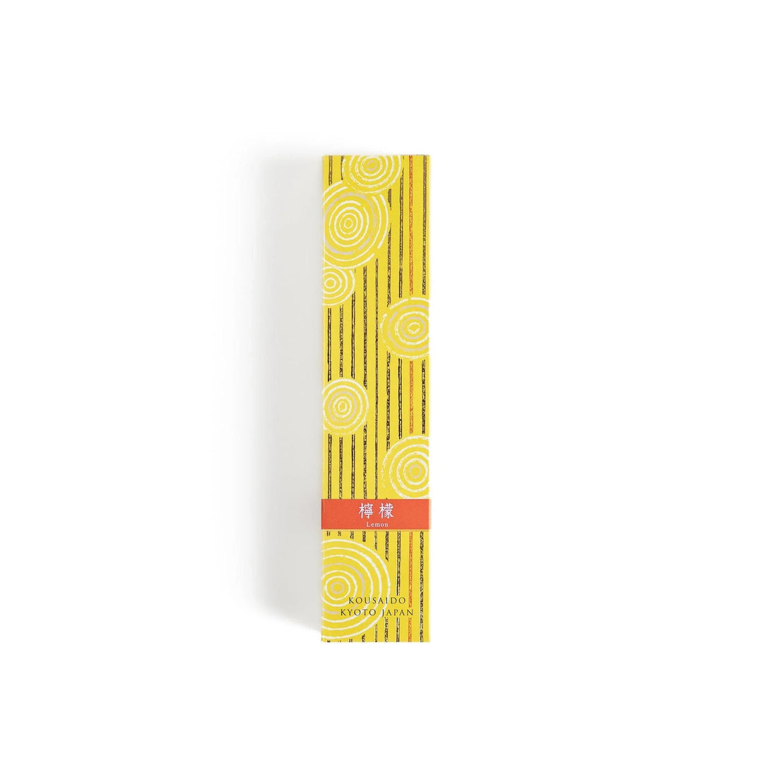 Japanese lemon incense sticks in a wooden box with a bright yellow patterned sleeve from Kyoto’s Kousaido