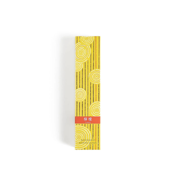 Japanese lemon incense sticks in a wooden box with a bright yellow patterned sleeve from Kyoto’s Kousaido
