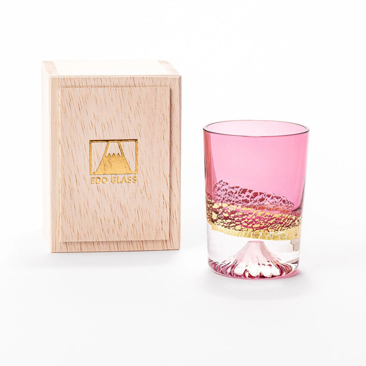Pink sake glass with gold-leaf mountain and Mount Fuji base, perfect for festive and elegant occasions.