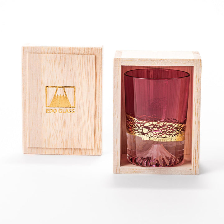 Pink sake glass with gold-leaf mountain and Mount Fuji base, perfect for festive and elegant occasions.