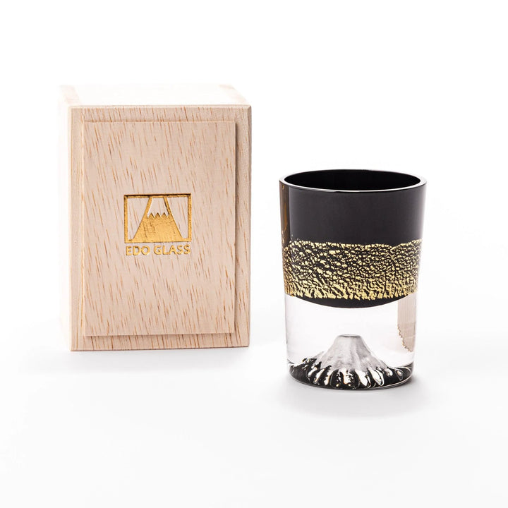 Black and clear sake glass with gold-leaf landscape and Mount Fuji base, offering bold Japanese elegance.