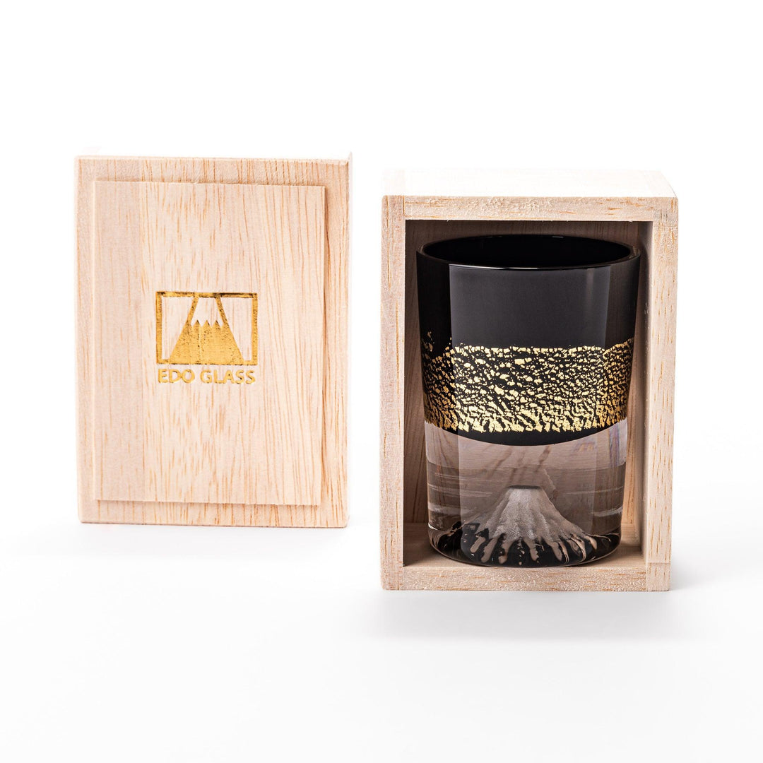 Black and clear sake glass with gold-leaf landscape and Mount Fuji base, offering bold Japanese elegance.