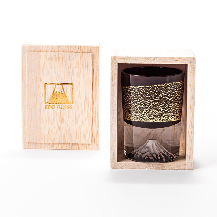 Deep red sake glass with gold-leaf mountain and Mount Fuji base, showcasing refined Japanese craftsmanship.