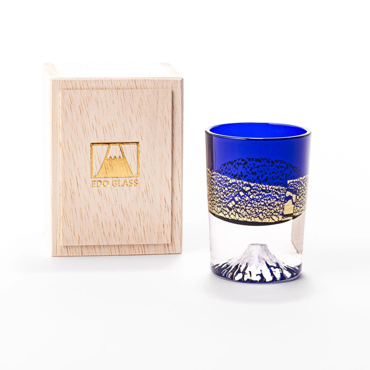 Deep blue sake glass with gold-leaf mountain and Mount Fuji base, blending traditional design with refined artistry.