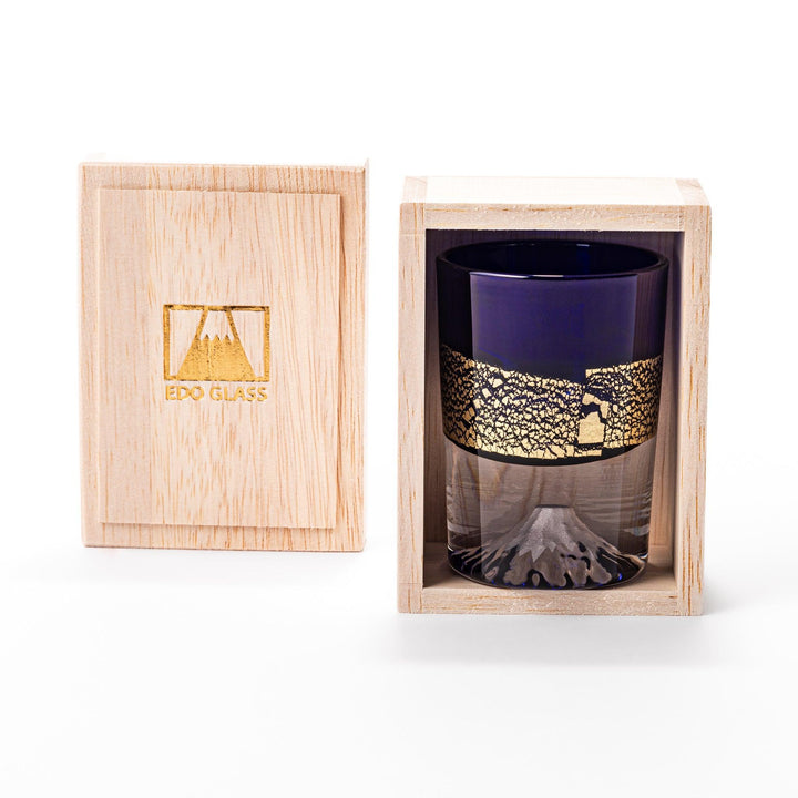 Deep blue sake glass with gold-leaf mountain and Mount Fuji base, blending traditional design with refined artistry.