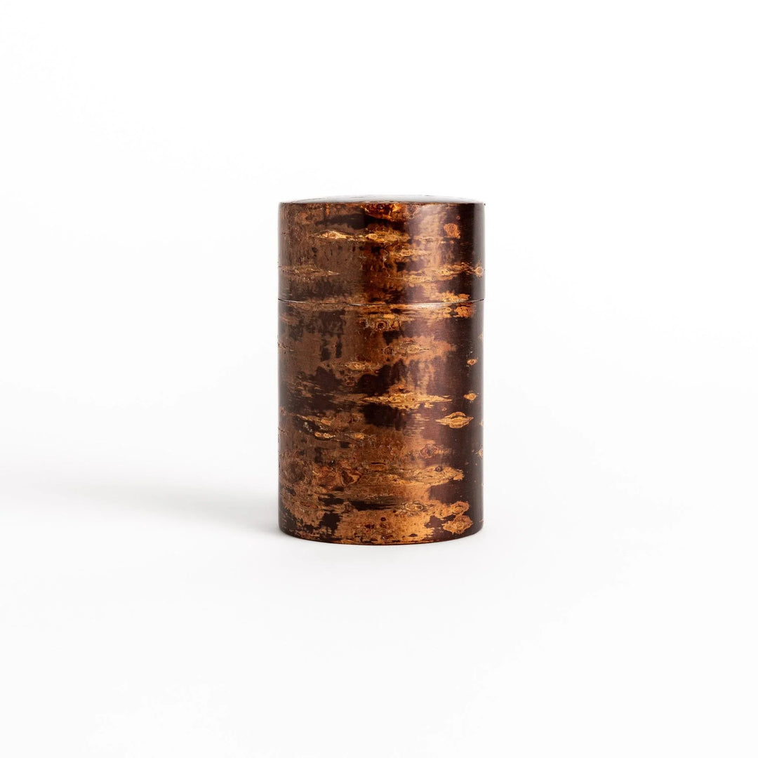 Cherry bark Japanese tea caddy with warm brown hue and natural grain perfect for storing fine tea.