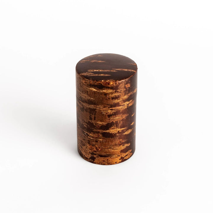 Cherry bark Japanese tea caddy with warm brown hue and natural grain perfect for storing fine tea.