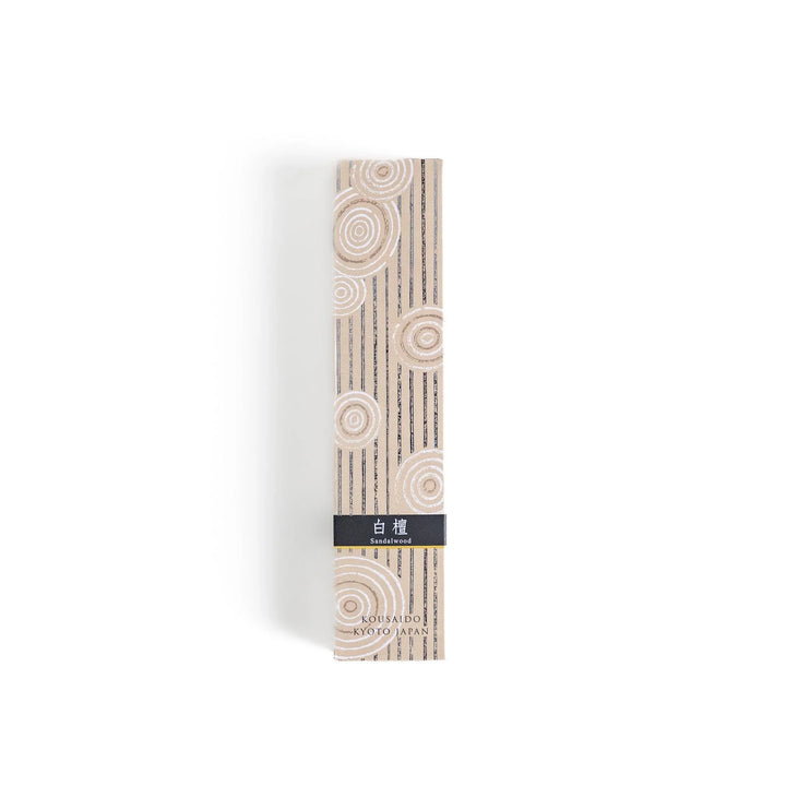 Japanese sandalwood incense sticks in a wooden box with an elegant beige patterned sleeve from Kyoto’s Kousaido