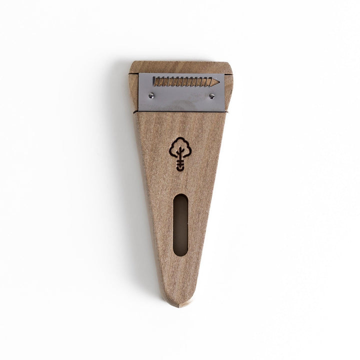 Nagomi Damascus utility knife with patterned blade and striped wooden handle offering precise everyday cutting.