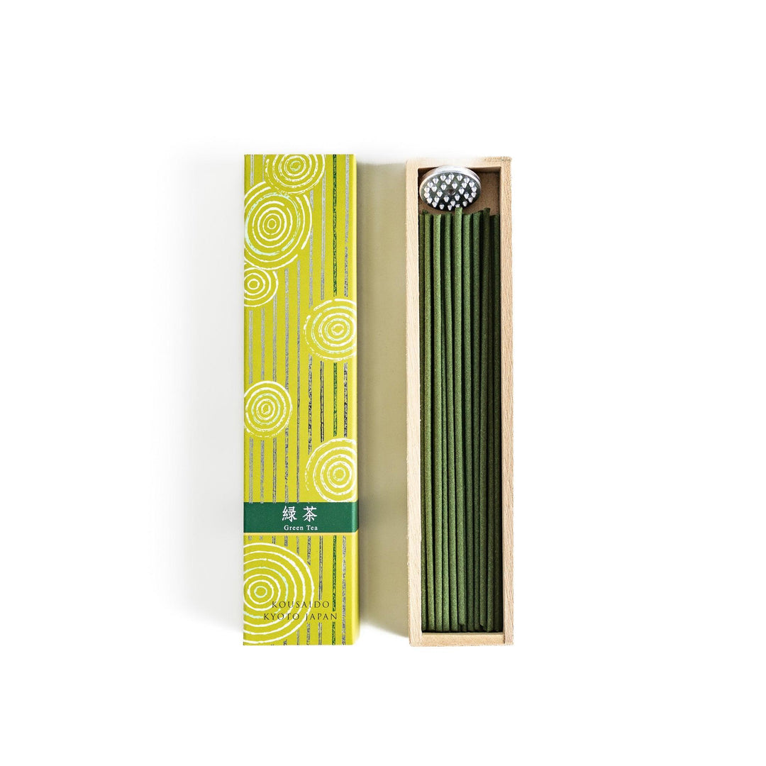 Japanese Green Tea incense sticks in a yellow patterned box with wooden holder, offering a fresh, soothing aroma from Kyoto