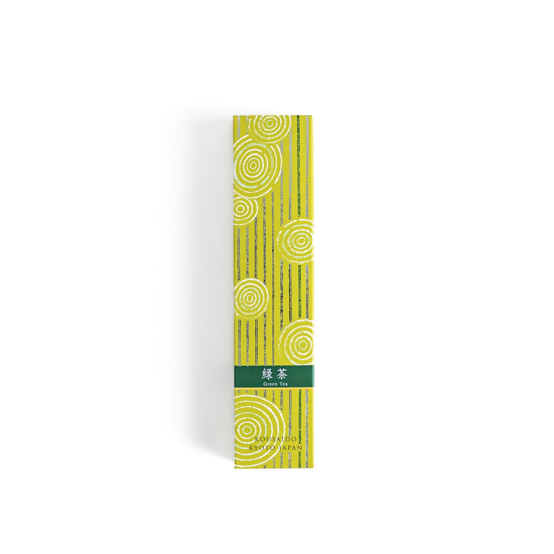 Japanese Green Tea incense sticks in a yellow patterned box with wooden holder, offering a fresh, soothing aroma from Kyoto