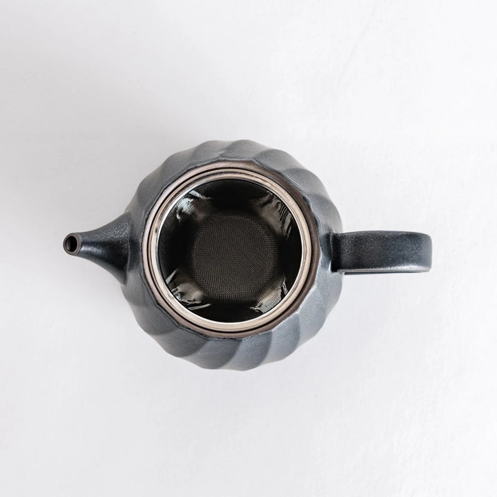 Inside view revealing the fine mesh filter, ensuring a smooth and delightful tea infusion for your enjoyment.