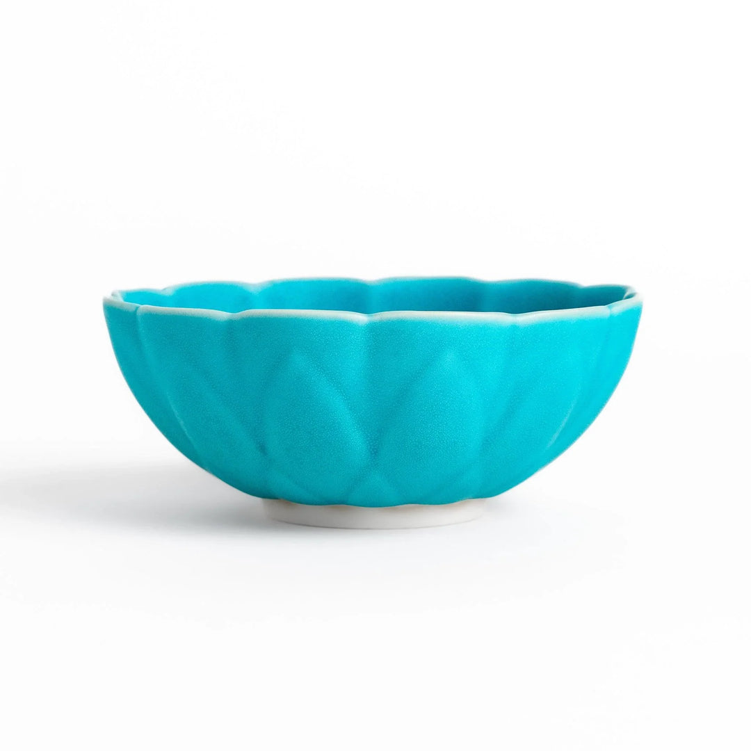 Turkish blue lotus-shaped dessert bowl with matte finish and white base, featuring delicate petal-like detailing.