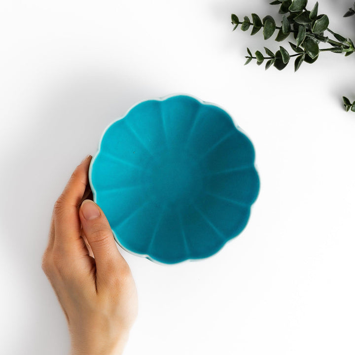 Turkish blue lotus-shaped dessert bowl with matte finish and white base, featuring delicate petal-like detailing.