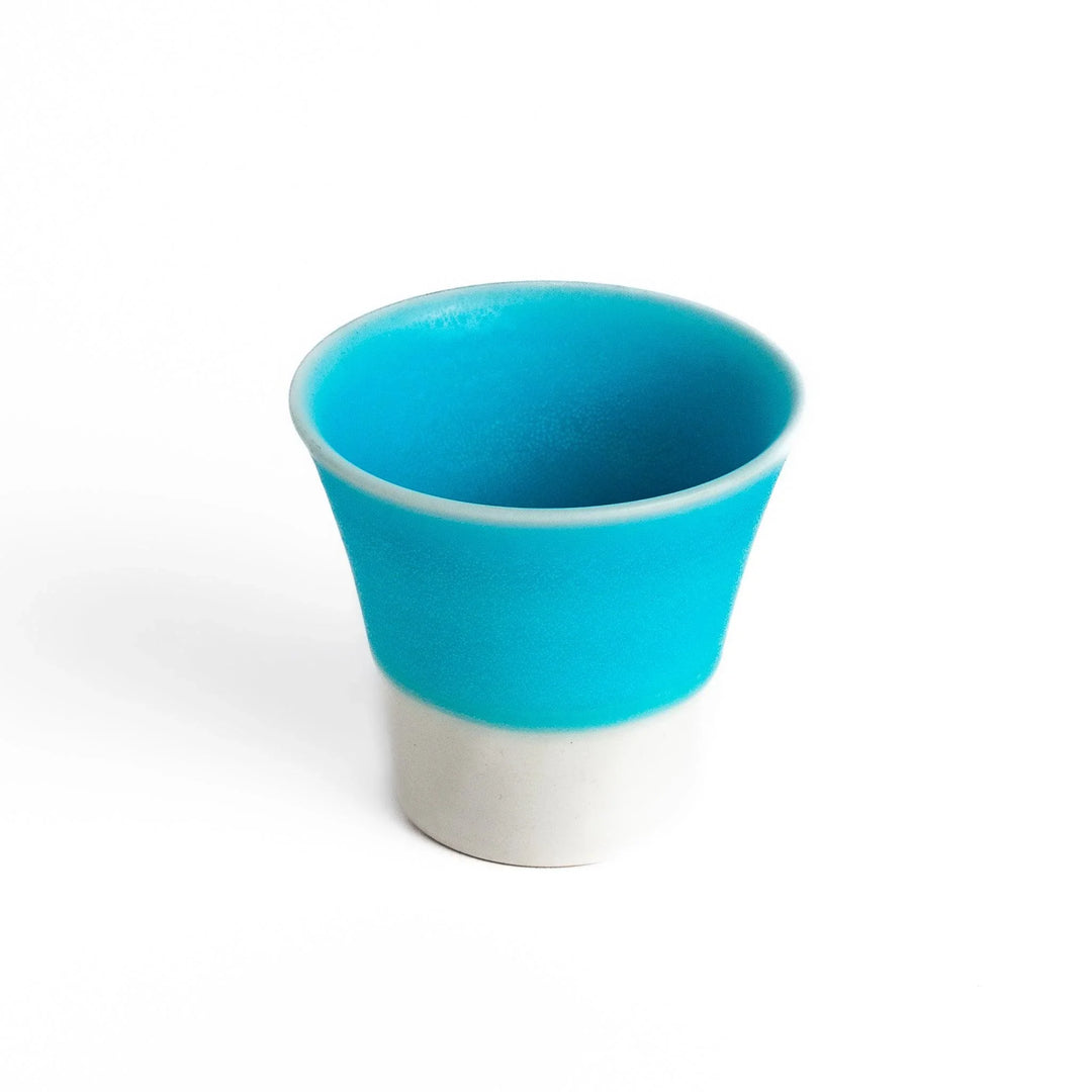 Turkish blue mini cup with matte finish and white base, perfect for small drinks or colorful table accents.