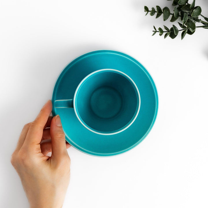 Turkish blue tea cup and saucer set with matte finish, offering a modern and elegant touch to tea rituals.
