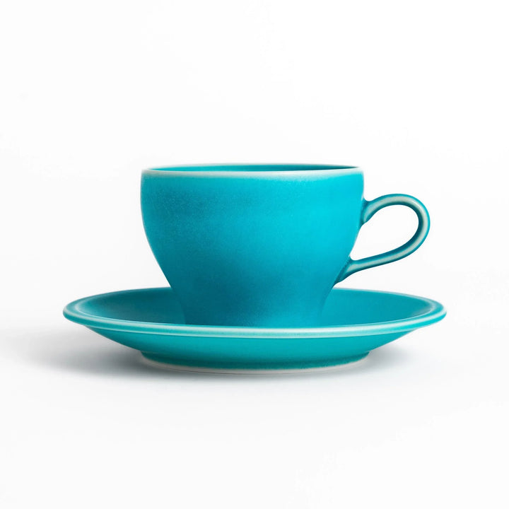 Turkish blue tea cup and saucer set with matte finish, offering a modern and elegant touch to tea rituals.