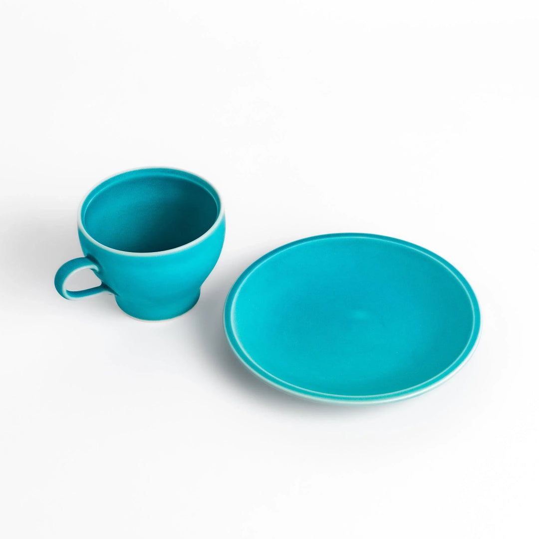 Turkish blue tea cup and saucer set with matte finish, offering a modern and elegant touch to tea rituals.