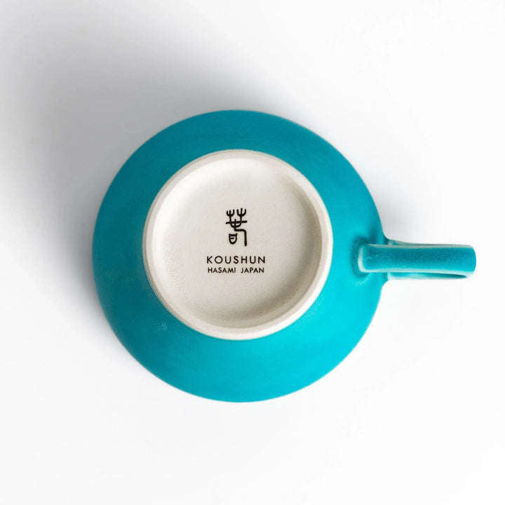 Turkish blue tea cup with matte finish and elegant curved shape, perfect for modern tea enjoyment.