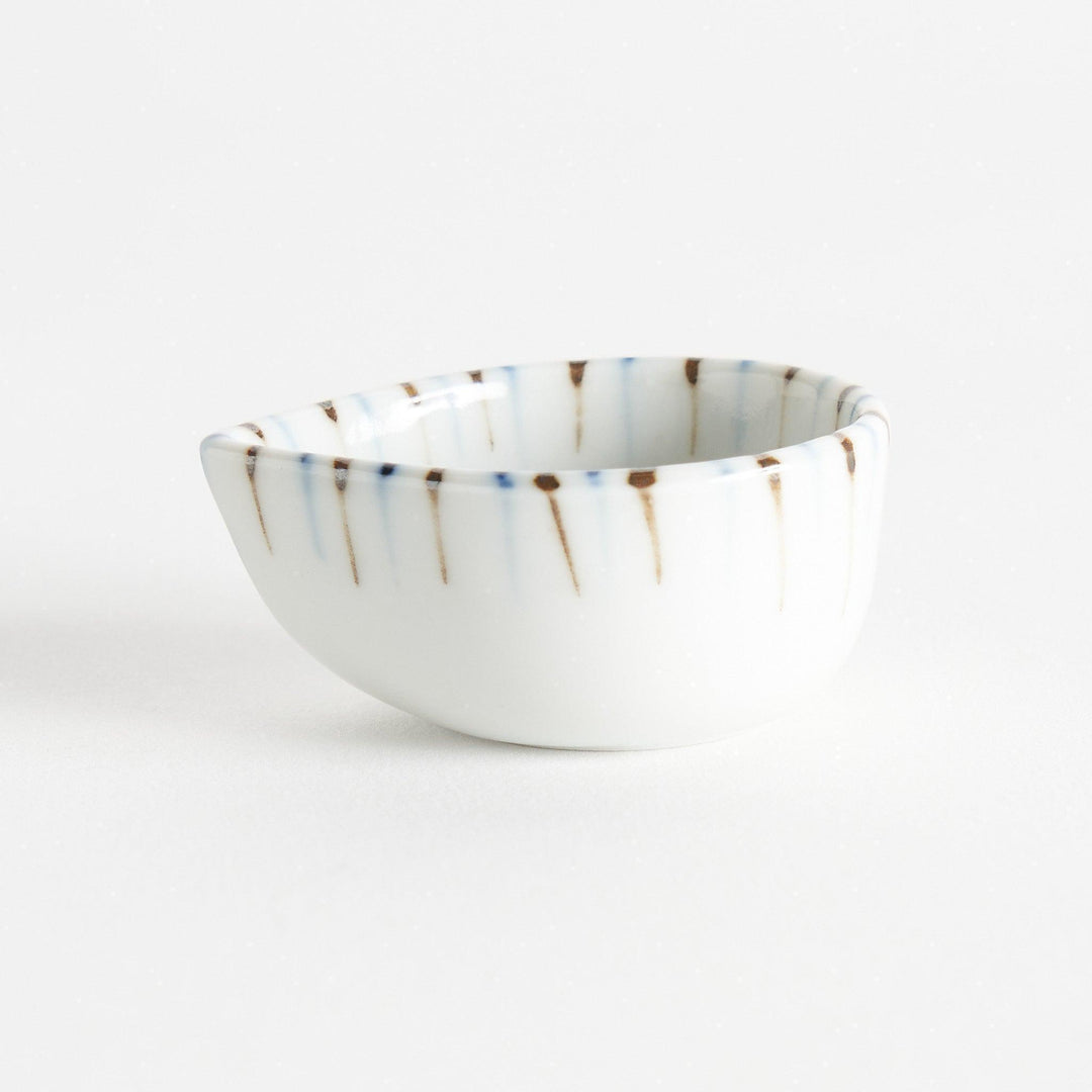 A small, curved condiment bowl featuring vertical blue and brown stripes.