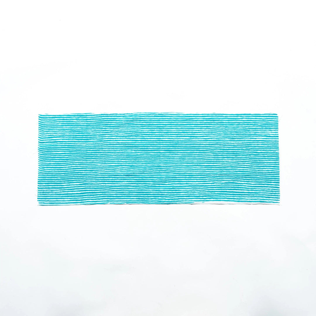 Bright blue hand towel with vertical white stripes, laid flat for full view.