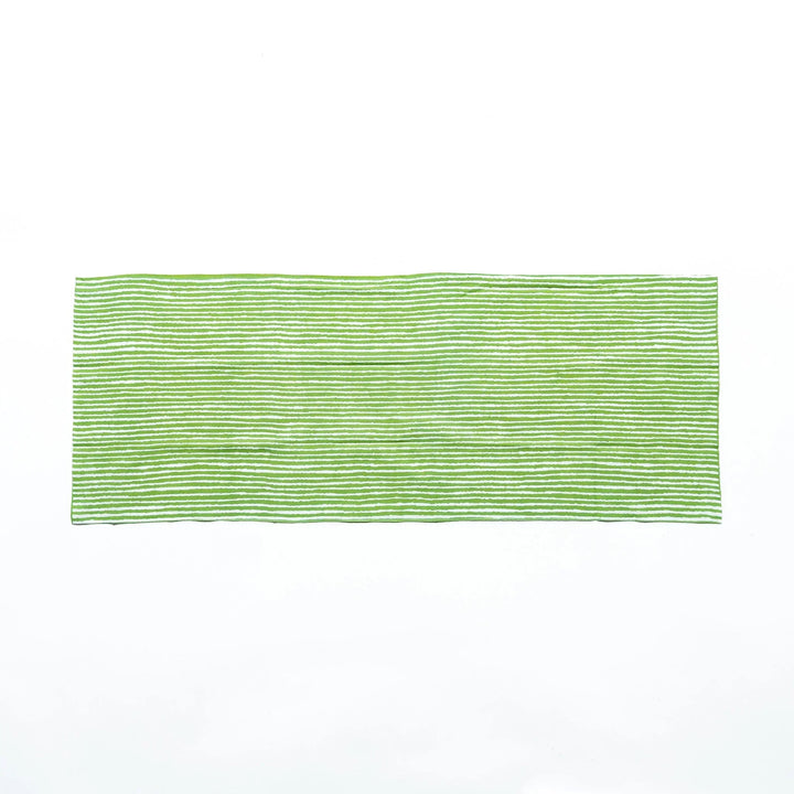 Green hand towel with vertical white stripes, laid flat for full view.