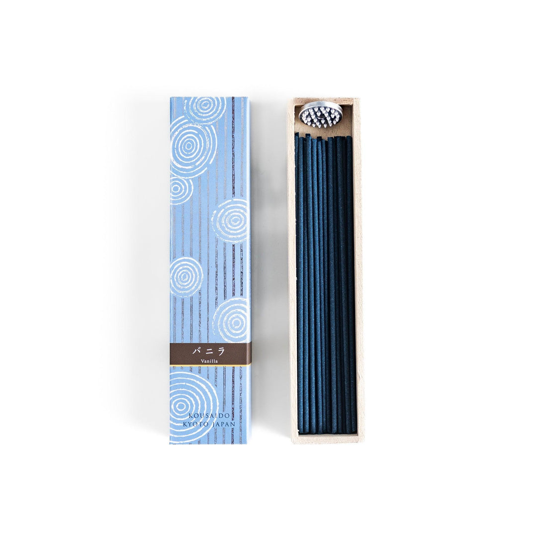 Japanese Vanilla incense sticks in a light blue patterned box with wooden holder, offering a warm and comforting fragrance