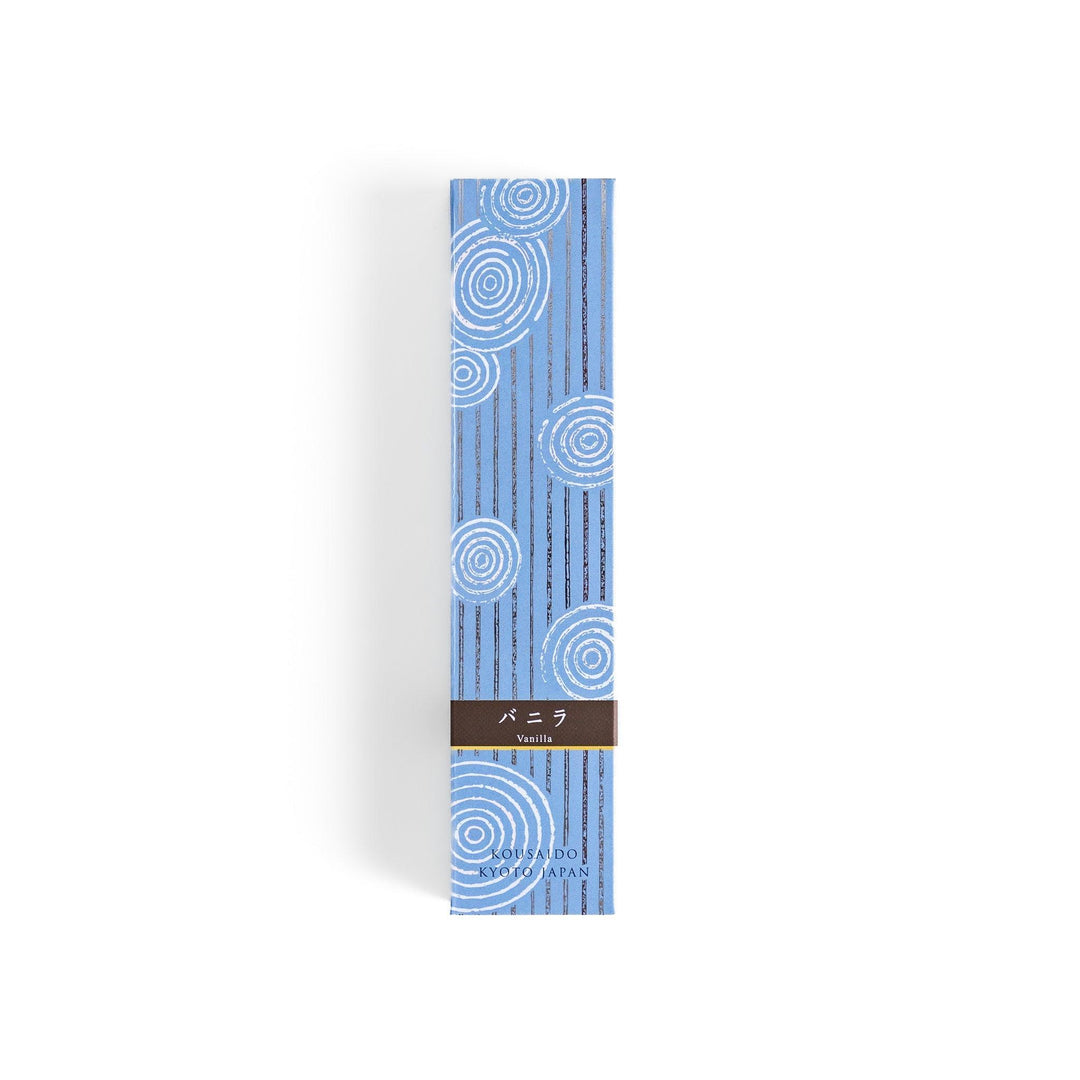 Japanese Vanilla incense sticks in a light blue patterned box with wooden holder, offering a warm and comforting fragrance