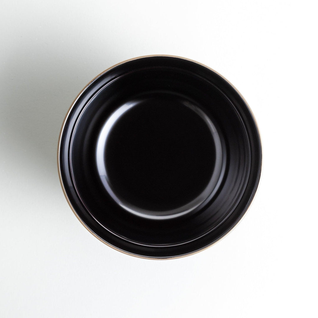Glossy lacquer soup bowl with matching lid and gold rim available in black or red for elegant serving.