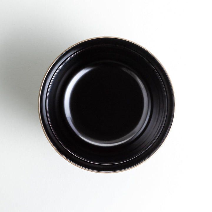 Glossy lacquer soup bowl with matching lid and gold rim available in black or red for elegant serving.