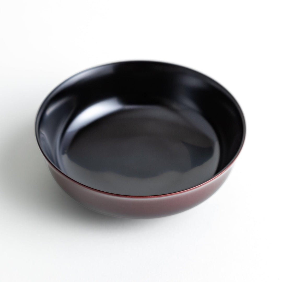 Glossy lacquer soup bowl with matching lid and gold rim available in black or red for elegant serving.