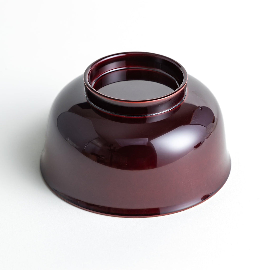 Glossy lacquer soup bowl with matching lid and gold rim available in black or red for elegant serving.