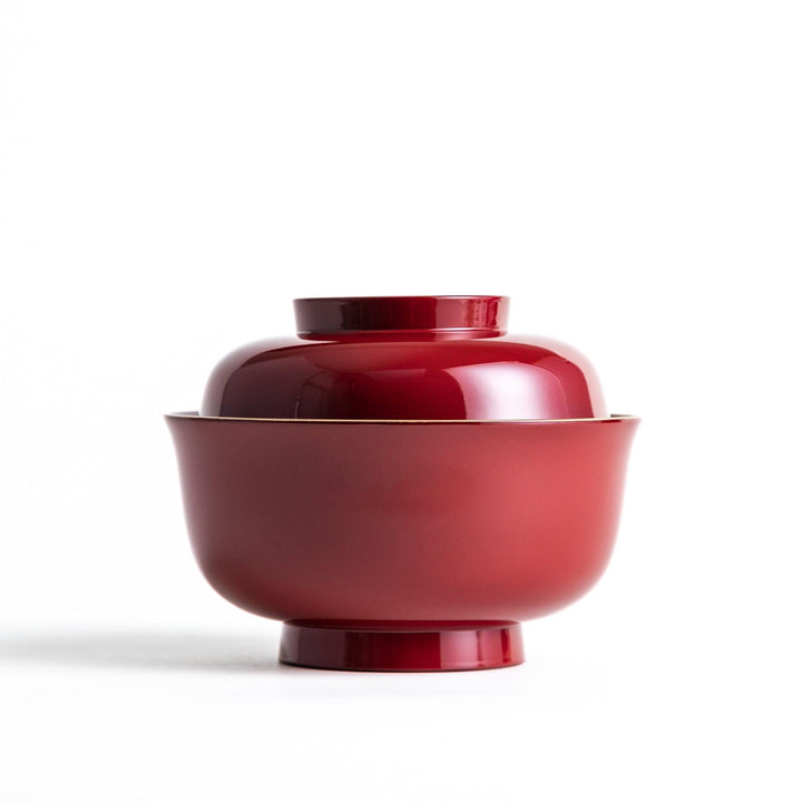 Glossy lacquer soup bowl with matching lid and gold rim available in black or red for elegant serving.