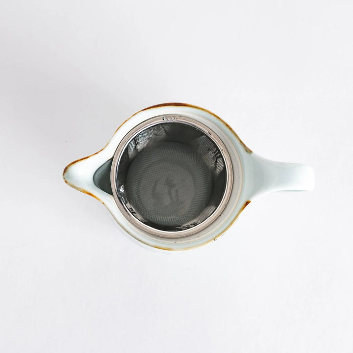 Teapot featuring a vintage-inspired vine pattern, perfect for serving tea in style and enhancing your table setting.