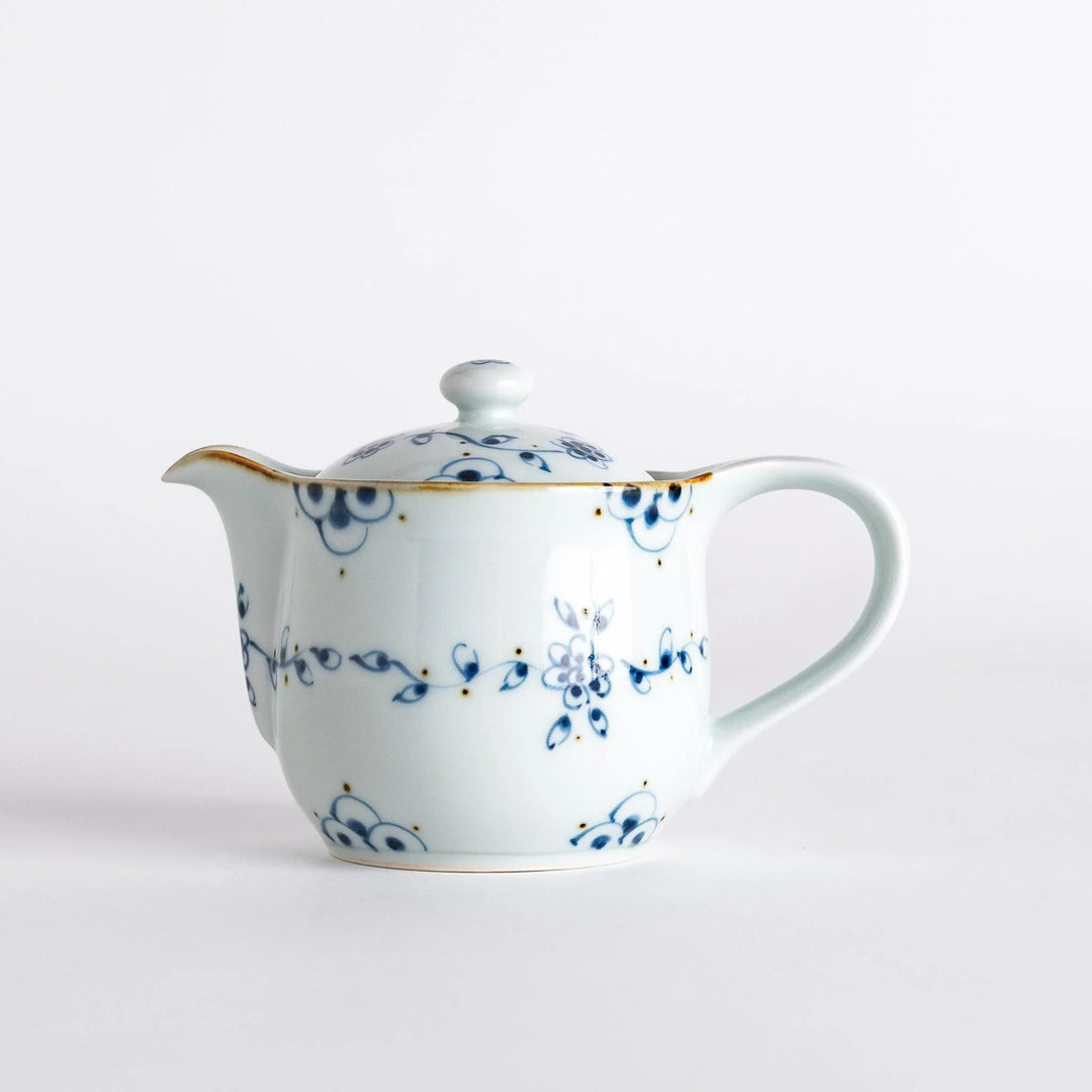 Top view of the teapot, highlighting the beautiful design and a convenient spout for easy pouring of your favorite tea.