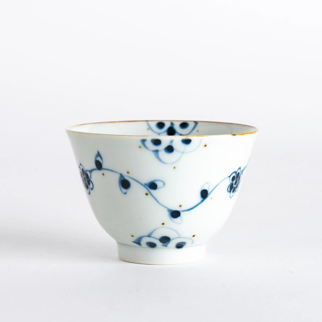 Vintage vine flower teacup showcasing the delicate floral pattern and refined structure, ideal for tea enjoyment.