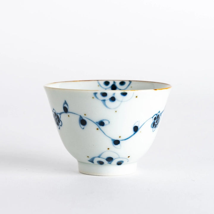 Vintage vine flower teacup showcasing the delicate floral pattern and refined structure, ideal for tea enjoyment.
