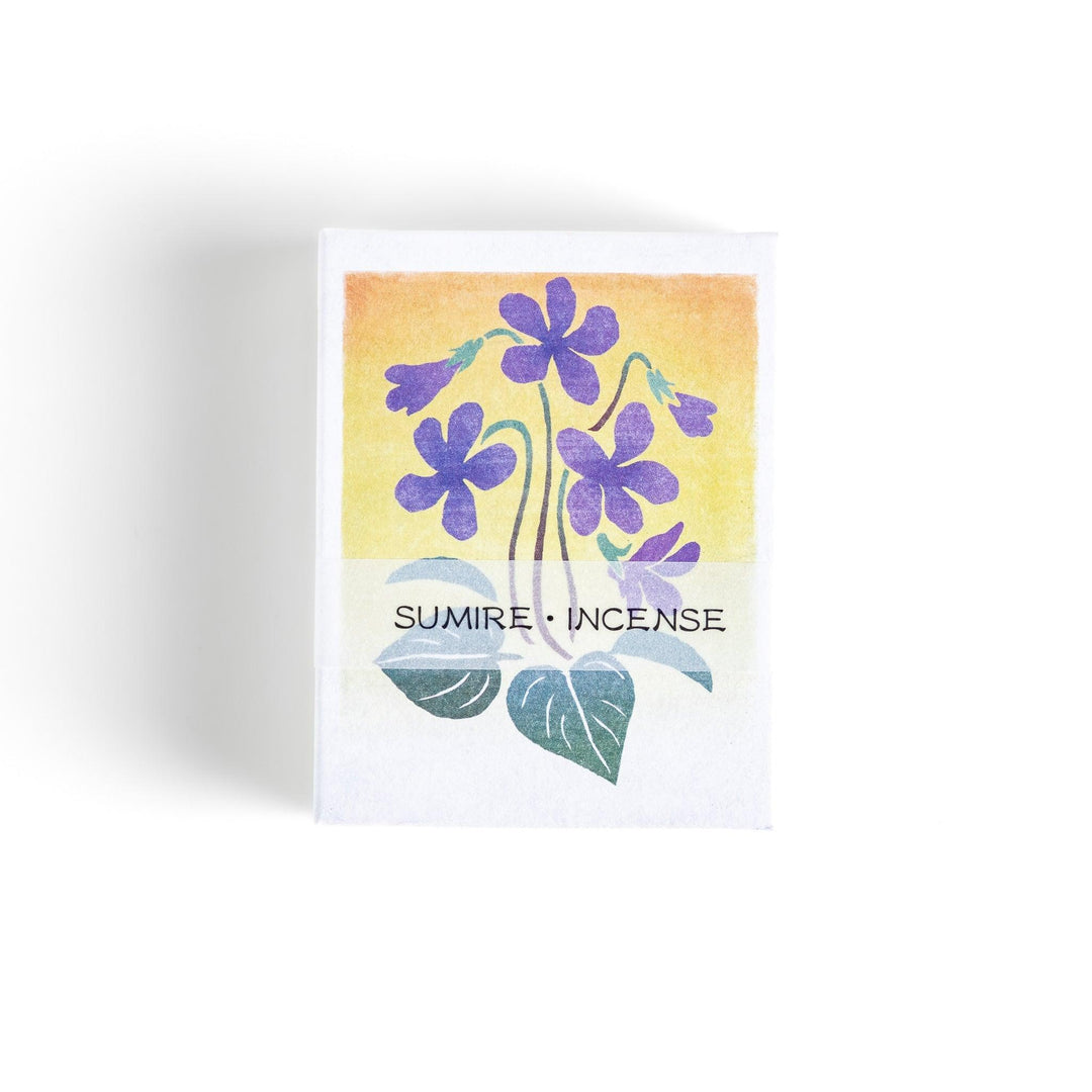 Incense with violet sticks in a box with violet flower design offering a floral soothing fragrance for relaxation.