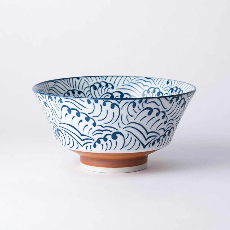 Blue and white ramen bowl with wave pattern.