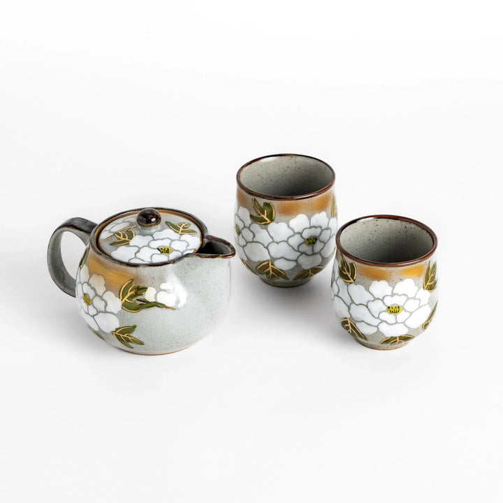 White peony tea set with teapot and two cups offering a serene and elegant tea experience.